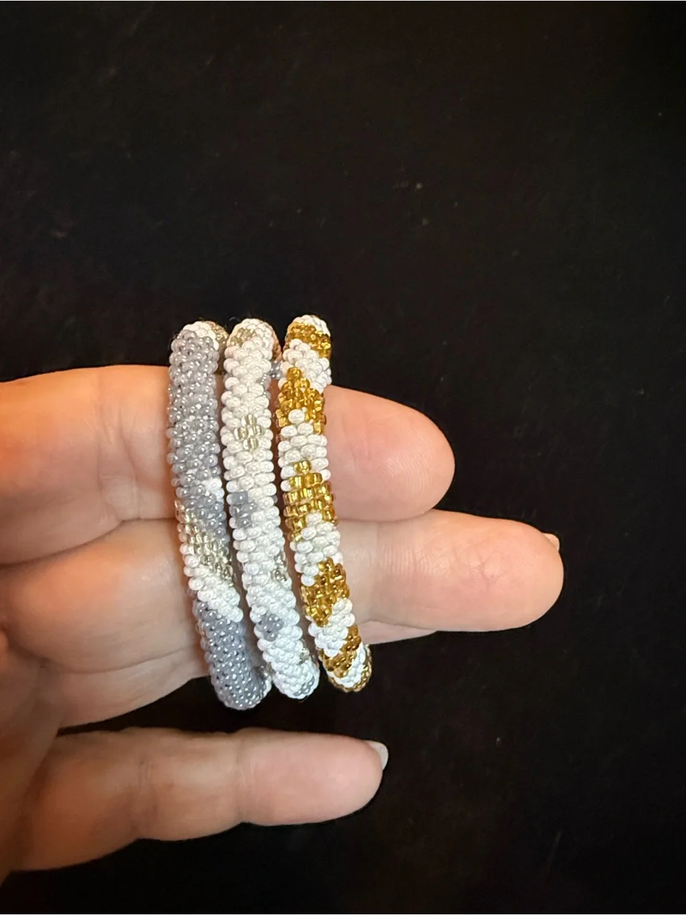 Aid through Trade bracelets making